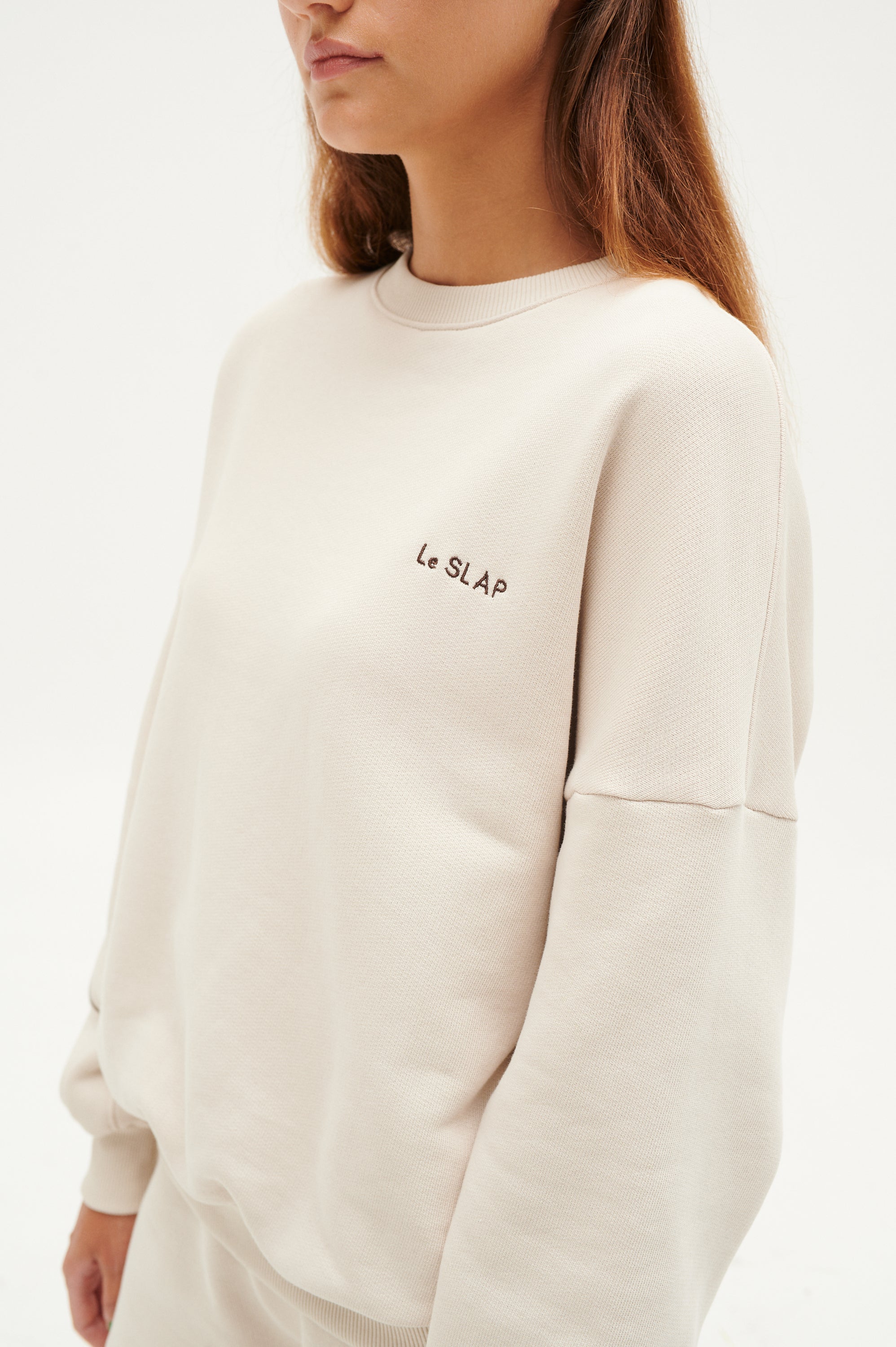 Le SLAP | UNIFORM She is a gun hoodie with brand's embroidery