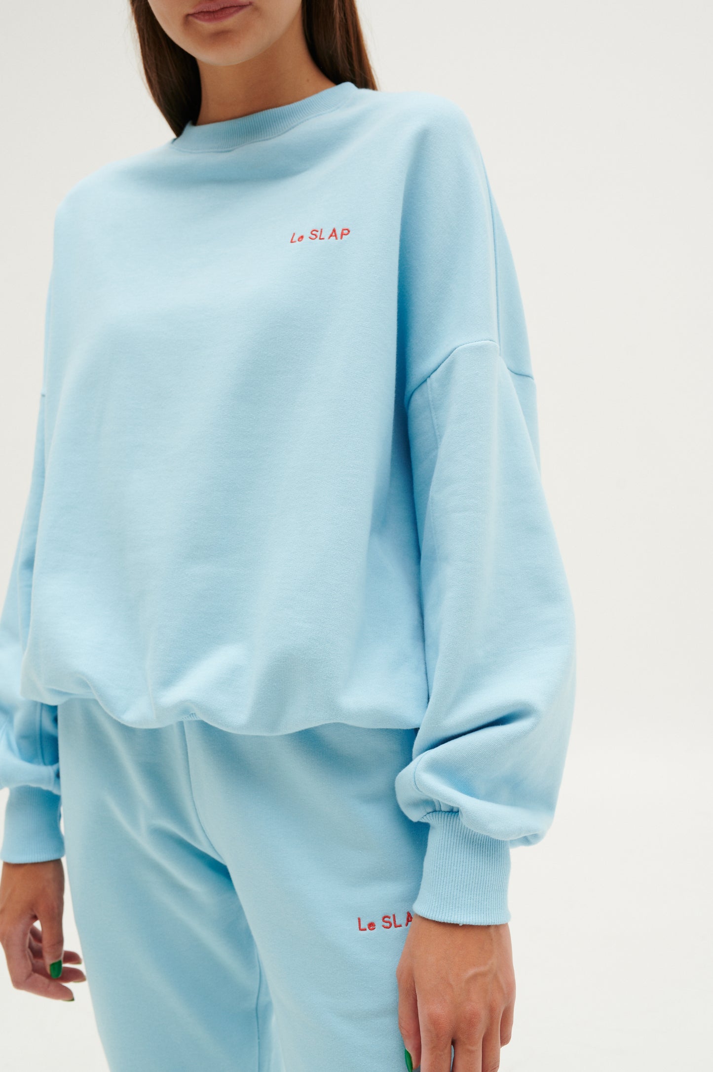 UNIFORM | Heaven blue hoodie with brand's embroidery