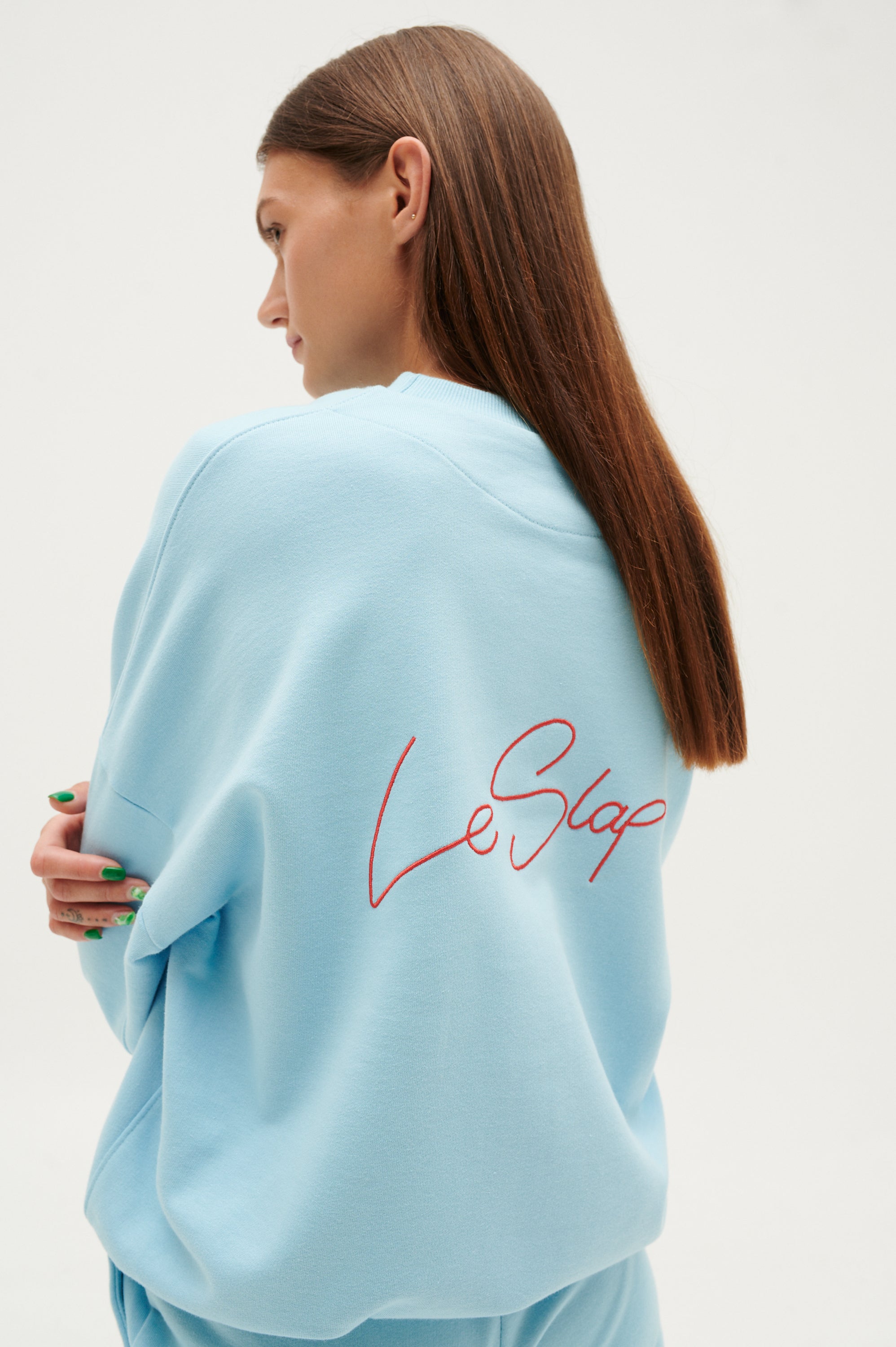 UNIFORM | Heaven blue hoodie with brand's embroidery