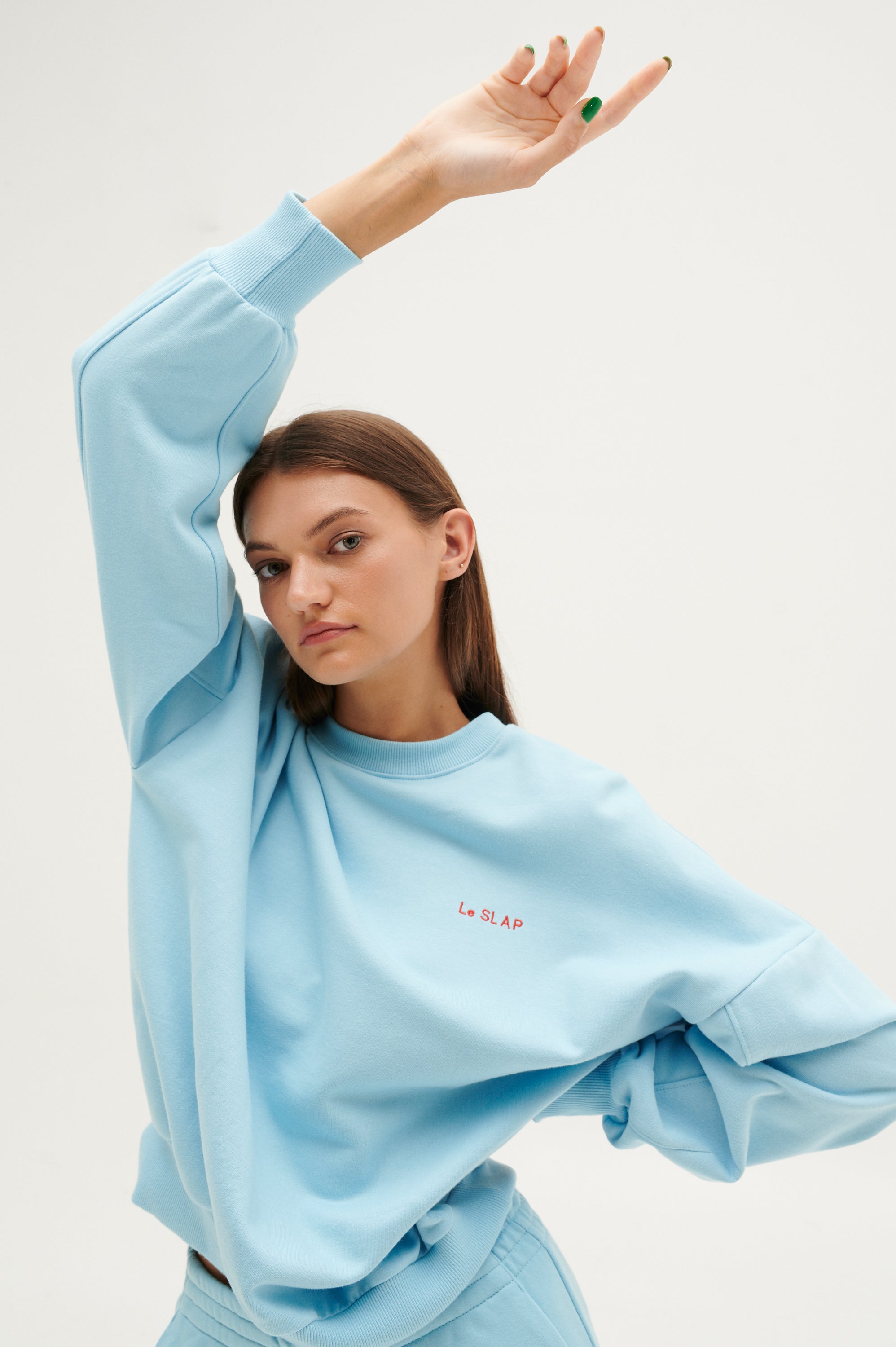 UNIFORM | Heaven blue hoodie with brand's embroidery